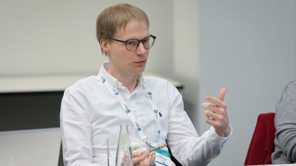 A member of the operational board explains patiently